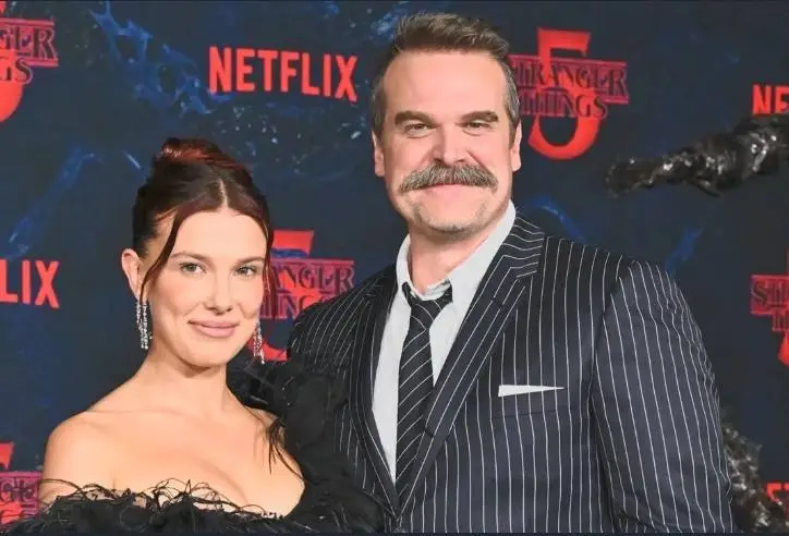 Millie Bobby Brown and David Harbour pose together as they reunite for Netflix's upcoming father-daughter spy drama series.