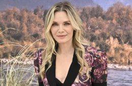 Michelle Pfeiffer smiles during an interview while reflecting on her breakthrough Grease 2 audition experience.