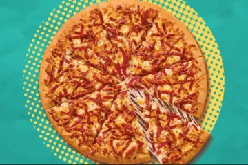 A Little Caesars Webberoni Pizza featuring a Spider-Man-inspired pepperoni web design created for the upcoming Spider-Man movie promotion.