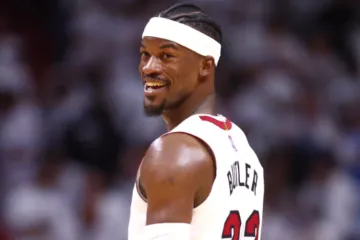 Jimmy Butler smiling during a public appearance as fans speculate about his possible country music album