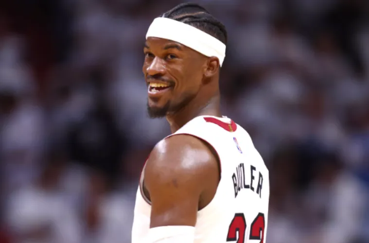 Jimmy Butler smiling during a public appearance as fans speculate about his possible country music album