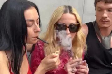 Madonna attending Paris Fashion Week as fans discuss her appearance alongside Charli XCX and Connor Storrie.