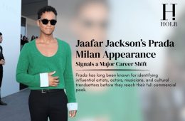 Jaafar Jackson attends Prada's Menswear Fashion Show during Milan Fashion Week 2026, posing in a stylish black outfit outside the event venue.
