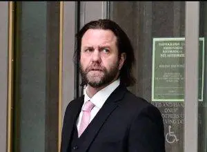 Director Carl Rinsch arrives at federal court after receiving a 30-month prison sentence for defrauding Netflix of production funds intended for the unfinished series White Horse.