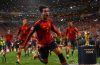 Spain celebrate their 1-0 extra-time victory over Argentina in the 2026 FIFA World Cup Final as players run across the pitch following Ferran Torres' winning goal.