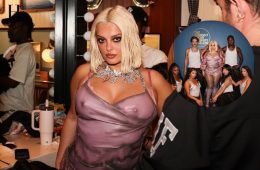 Bebe Rexha wearing a sheer mauve mini dress during her appearance on The Tonight Show Starring Jimmy Fallon.