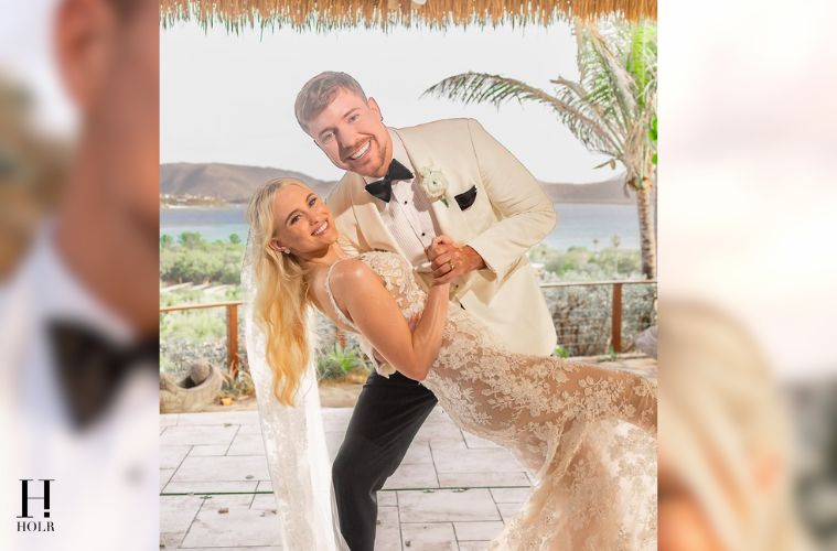 MrBeast and Thea Booysen smiling together in their wedding attire after announcing their marriage on Instagram.