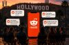A cinematic illustration showing Hollywood and Reddit communities discussing movies, TV shows and celebrity news online.