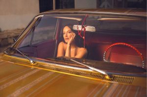 Kacey Musgraves shares artistic nude behind-the-scenes photos from her "Mexico Honey" music video filmed in Jalisco, Mexico.
