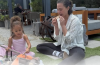 Chrissy Teigen and her four children enjoying a family outing in Rome while supporting John Legend on tour.