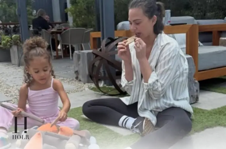 Chrissy Teigen and her four children enjoying a family outing in Rome while supporting John Legend on tour.