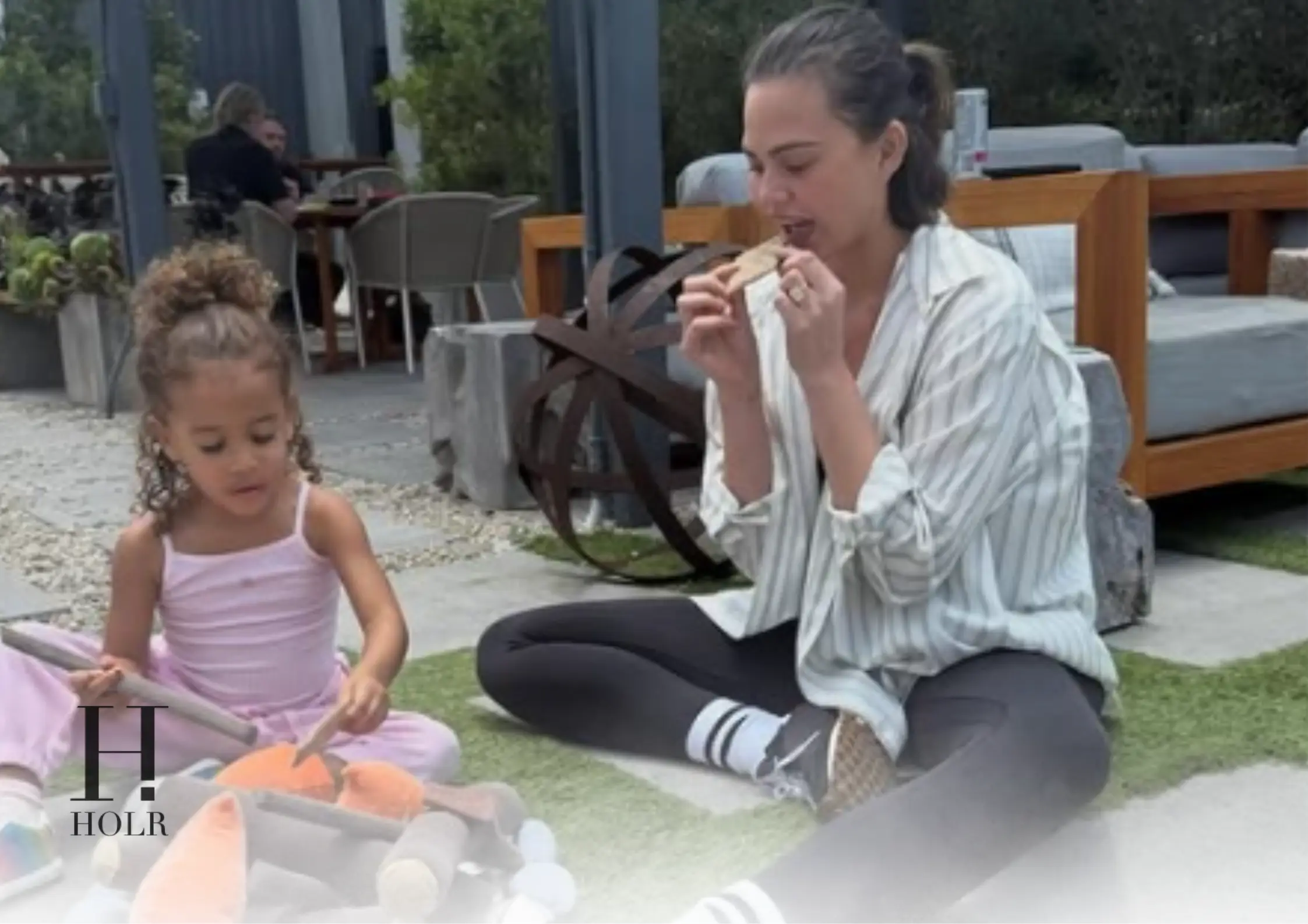 Chrissy Teigen and her four children enjoying a family outing in Rome while supporting John Legend on tour.