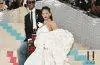 Rihanna and A$AP Rocky attending a red carpet event together.