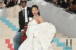 Rihanna and A$AP Rocky attending a red carpet event together.