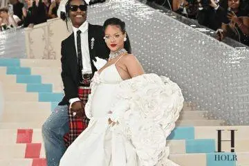 Rihanna and A$AP Rocky attending a red carpet event together.
