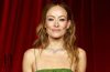 Olivia Wilde discusses her upcoming directing project Naughty, an ambitious holiday comedy starring Jennifer Aniston and Peter Dinklage.