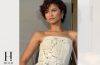 Zendaya wearing an elegant white gown while promoting The Odyssey.