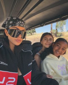 Kim Kardashian Embraces the 'Lakemaxxing' Trend in Relaxed Summer Photo Dump