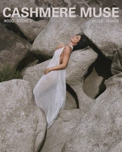 Kylie Jenner poses with the new Mood Stones fragrance trio from Kylie Cosmetics.