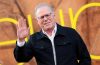 David Zaslav speaking at a corporate event alongside Warner Bros. Discovery branding following his latest scheduled stock sale.