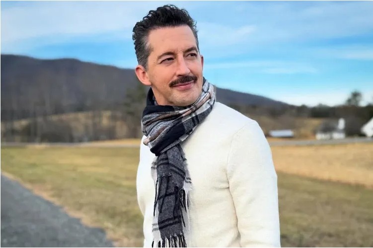 Broadway actor Josh Grisetti during a stage performance, remembered for his contributions to theater and television.