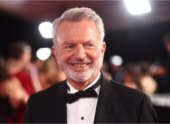 Sam Neill attending a film premiere during his celebrated career in cinema.