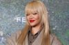 Rihanna attending a public event, highlighting her career as a global music icon, entrepreneur, and philanthropist.