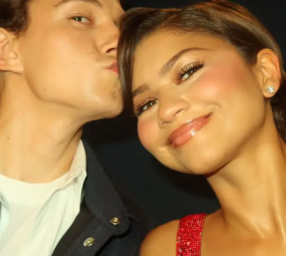 Zendaya and Tom Holland attending a red carpet event while promoting the Spider-Man franchise.