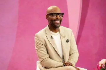 Karamo Brown and Jussie Smollett are photographed together during a PDA-filled outing in Los Angeles that sparked romance speculation.