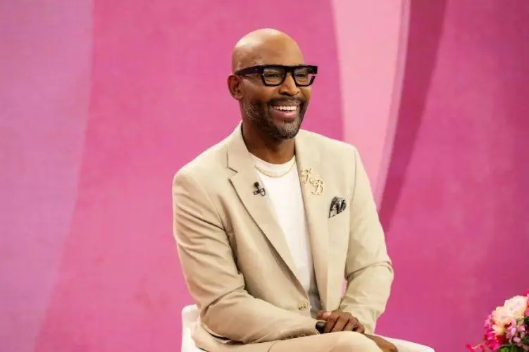 Karamo Brown and Jussie Smollett are photographed together during a PDA-filled outing in Los Angeles that sparked romance speculation.