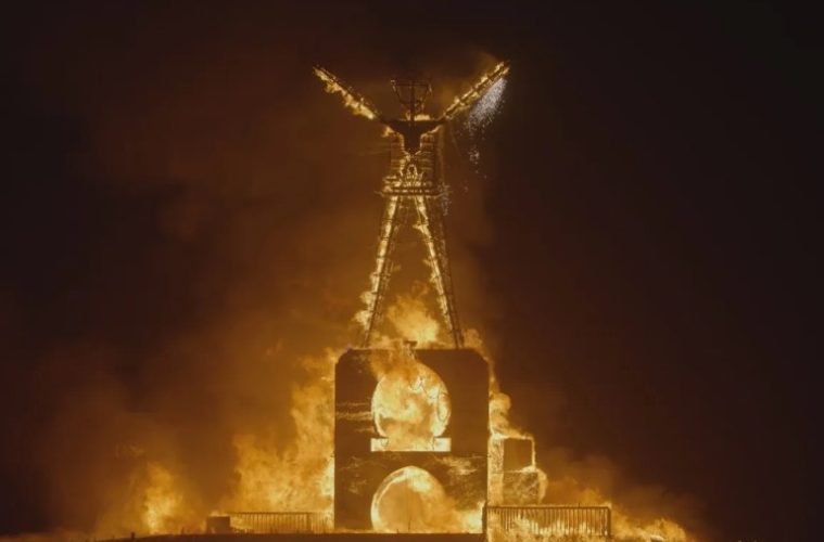 A scene from HBO's The Man Will Burn showcasing Burning Man's iconic art installations in Nevada's Black Rock Desert.