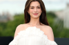 Anne Hathaway poses with her baby bump at The Odyssey London photocall alongside Robert Pattinson and the film's cast.