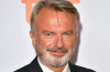 Sam Neill at a public event, remembered following the announcement of his cause of death and plans for a private memorial in New Zealand.