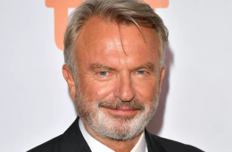 Sam Neill at a public event, remembered following the announcement of his cause of death and plans for a private memorial in New Zealand.
