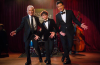 Tony Danza, Mario Lopez, and Dominic Lopez in a festive scene from Christmas at The Starlight.