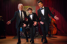 Tony Danza, Mario Lopez, and Dominic Lopez in a festive scene from Christmas at The Starlight.