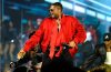 Usher performing during his Nashville concert before respectfully ending an onstage interaction with a fan.