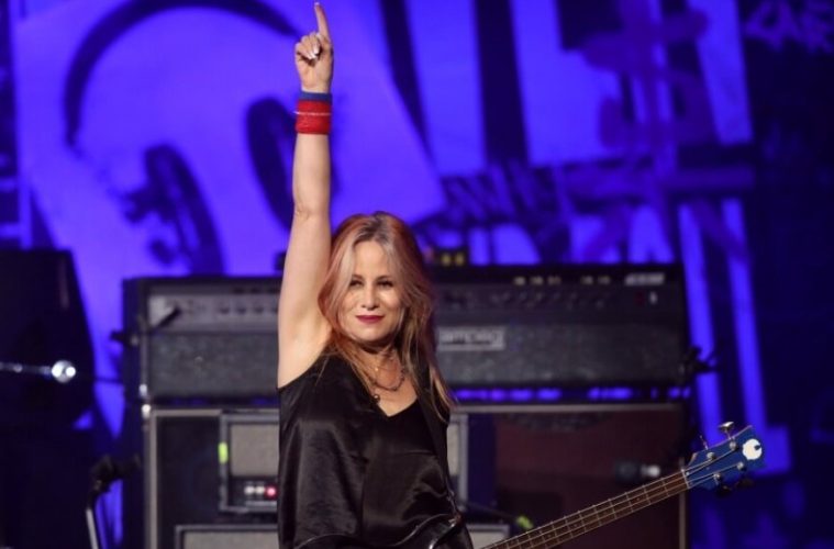 Jennifer Finch performing on stage with L7 before stepping away from the band's farewell tour following her brain cancer diagnosis.