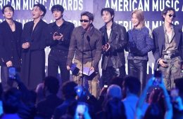The seven BTS members during a group appearance after announcing they will not submit music for the 2027 Grammy Awards.