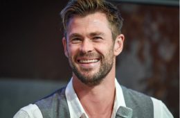 Chris Hemsworth attending a red carpet event, highlighting his successful Hollywood career and role as Marvel's Thor.