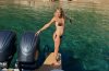 Kate Hudson enjoying a family vacation aboard a boat in Greece during the summer.