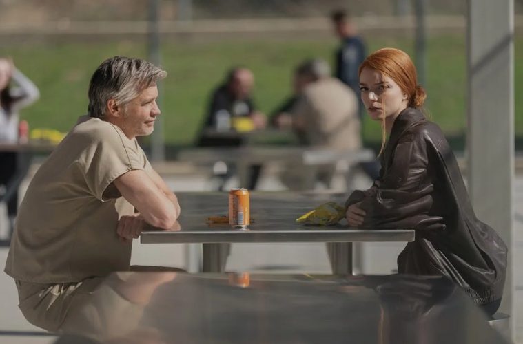 Anya Taylor-Joy in a scene from Apple TV+'s Lucky, portraying a con artist navigating danger and shifting identities.