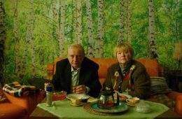 A scene from Black Money for White Nights featuring the central couple navigating financial hardship and family conflict.