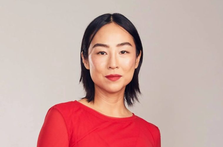 Greta Lee attends a red carpet event while reflecting on her career journey and finding success later in Hollywood.