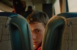 A scene from 3 Weeks After featuring high school students during a tense and unsettling class trip.