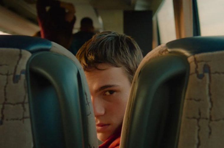 A scene from 3 Weeks After featuring high school students during a tense and unsettling class trip.