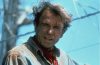 Sam Neill attending a film event, remembered following the announcement of his cause of death and private memorial plans.