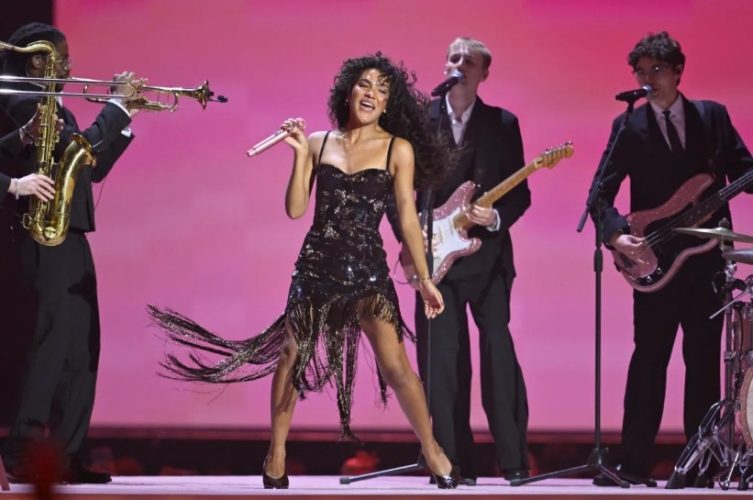 Olivia Dean performing live during her Art of Loving Tour concert in Los Angeles.