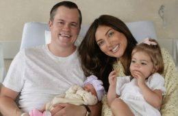 Campbell "Pookie" Puckett and Jett Puckett pose with their two daughters in their first family photos as a family of four.