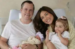 Campbell "Pookie" Puckett and Jett Puckett pose with their two daughters in their first family photos as a family of four.